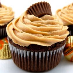 Reese's Peanut Butter Cups in the Filling and on Top of Chocolate Cupcake and Peanut Butter Frosting..