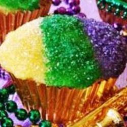 Mardi Gras King Cake. Filled with Candy Sprinkles. Butter Cream Frosting and colored and Sanding Sugar 