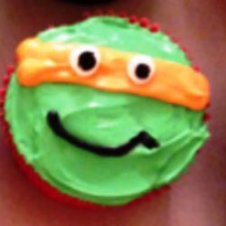 Michelangelo or any Mutant Ninja Turtle. any Flavor Cupcakes with Butter Cream Frosting and Candy decorations.