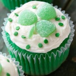 St. Patrick's Day. Green Velvet Cupcake with Cream Cheese Frosting and Cansy decorations.