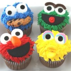 Sesame Street. Any flavor cupcakes with Butter Cream Frosting and Candy decorations.