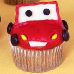 Lightning McQueen. Any flavor cupcake with Butter Cream Frosting and Candy decorations.