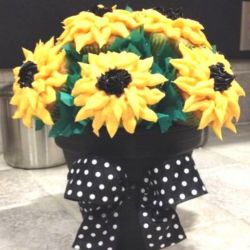 Sunflowers Cupcake Bouquet. Any flavor Cupcakes with Butter Cream Frosting in a decorative Cupcake Box.