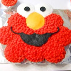 Elmo Pull Apart Cupcake Cake. Any flavor Cupcake, Butter Cream Frosting and Candy decorations.