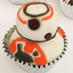 BB8. Any Flavor Cupcakes with Butter Cream Frosting, Doughnut Hole Head and Candy decorations.