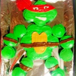 Any Mutant Ninja Turtle with any Flavor Cupcakes with Butter Cream Frosting and Candy decorations.