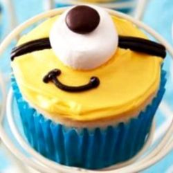 Kevin Minion Cupcake. any flavor cupcake with Butter Cream Frosting, Marshmallow and Candy decorations. 
