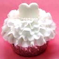 Bride's Dress. Any flavor cupcake with Butter Cream Frosting and Candy decorations.
