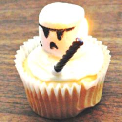 Storm Trooper. Any Flavor Cupcakes with Butter Cream Frosting. Marshmallow Head and Candle decorations.