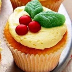 Christmas Vanilla cupcake with Butter Cream Frosting and Candy decorations. 