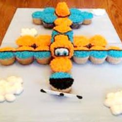 Airplane Pull Apart Cupcake Cake. Any flavor Food Cupcake, Butter Cream Frosting and Candy decorations.